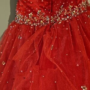 Elegant Red Woman's Gown with Sparkling Details